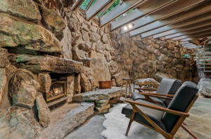 7 Creative Ways to Pair Lighting and Texture with Rocks for Fireplace Wall Designs